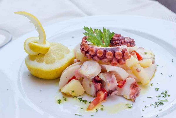 Polpo in umido con patate e peperoni